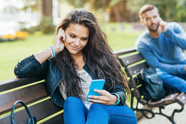 Girl texting a man